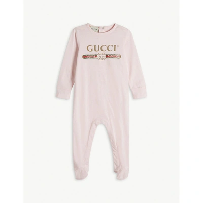 Shop Gucci Pale Pink Vintage Logo-print Footed Cotton Baby Grow 0-24 Months 18-24 Months
