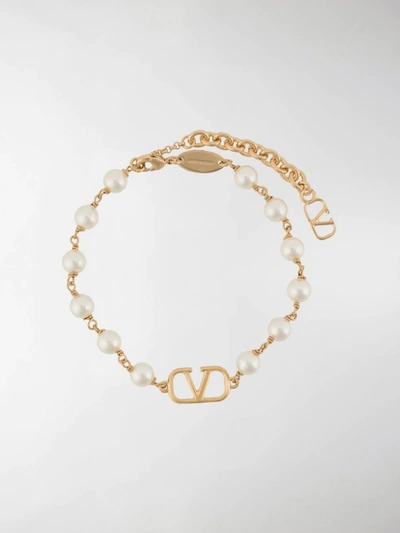 Shop Valentino Vlogo Pearl Bracelet In White