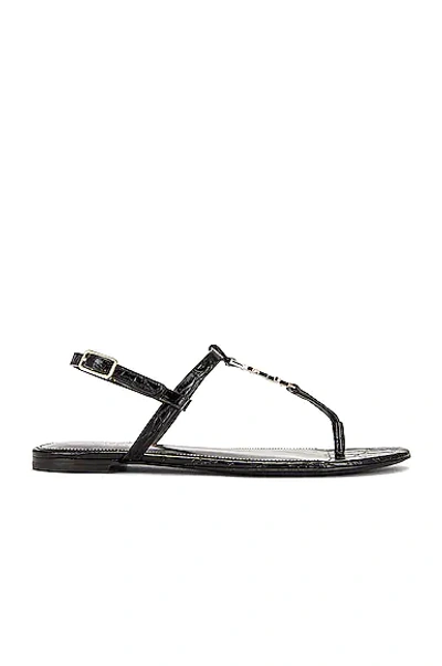 Shop Saint Laurent Embossed Croc Cassandra Flat Sandals In Nero