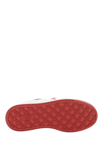 Shop Valentino One Stud Nappa Sneakers In White,red