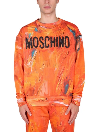 Shop Moschino "painting" Sweatshirt In Orange