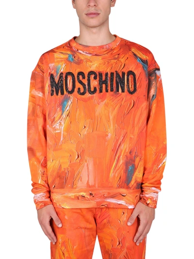 Shop Moschino Painting Sweatshirt In Arancione