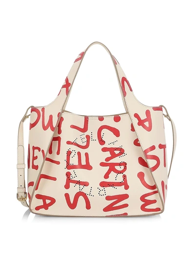 Shop Stella Mccartney Graffiti Logo Tote Crossbody Bag In Ivory