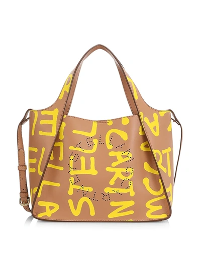 Shop Stella Mccartney Graffiti Logo Tote Crossbody Bag In Camel