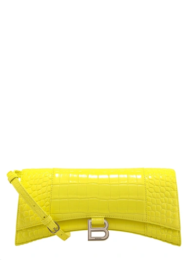 Shop Balenciaga Hourglass Embossed Shoulder Bag In Yellow