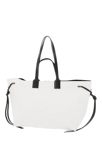 Shop Isabel Marant Logo Embossed Shoulder Bag In White