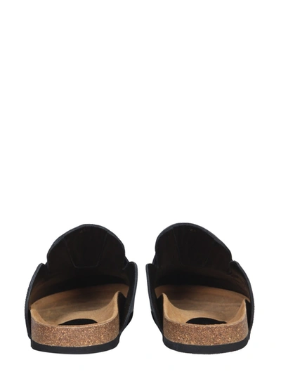 Shop Jw Anderson Leather Mules In Black