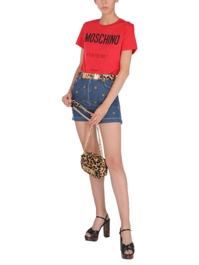 Shop Moschino Shorts With Embroidered Teddy In Denim