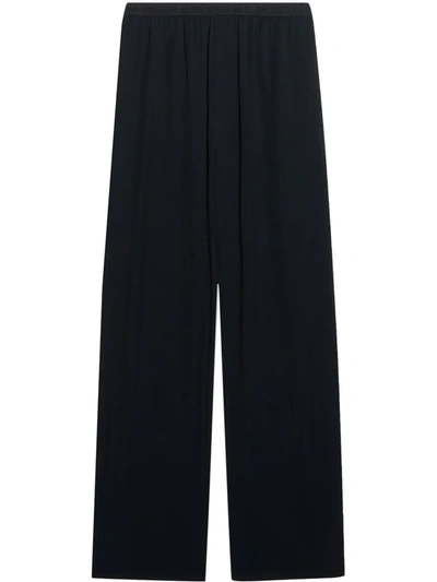 Shop Balenciaga Elastic Straight-leg Trousers In Black