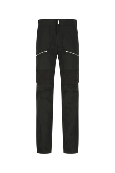Shop Givenchy Zip Pocket Cargo Pants In Black