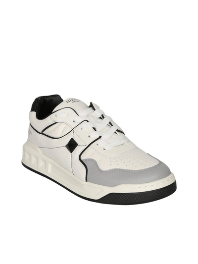 Shop Valentino Garavani Leather Sneakers In White
