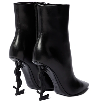 Shop Saint Laurent Opyum 110 Leather Ankle Boots In Nero