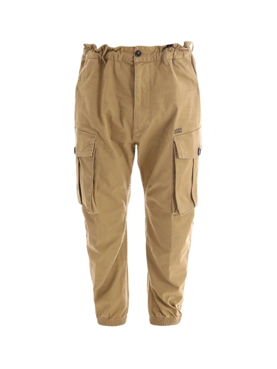 Shop Dsquared2 Logo Printed Tapered Cargo Trousers In Beige