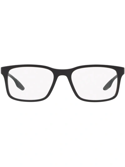 Shop Prada Logo-arm Rectangular Glasses In Black