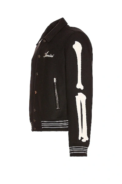 Shop Amiri Bones Varsity Jacket In Black