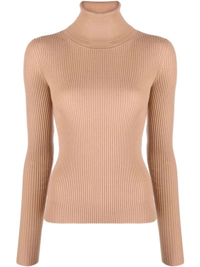 Shop Joseph Ribbed Roll Neck Jumper In Nude