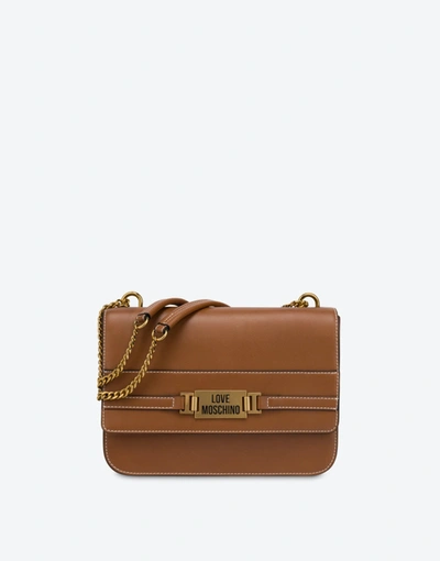 Shop Love Moschino Plaque Shoulder Bag In Leather