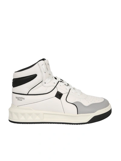 Shop Valentino Garavani Leather Sneakers In White