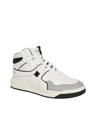 Shop Valentino Garavani Leather Sneakers In White