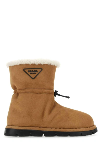 Shop Prada Logo Patched Shearling Boots In Brown