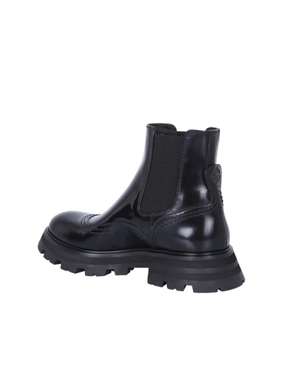 Shop Alexander Mcqueen Leather Ankle Boots In Black