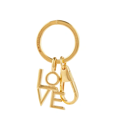 Shop Saint Laurent Love Key Chain In Gold