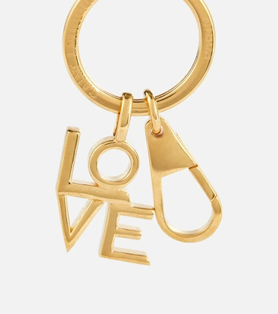 Shop Saint Laurent Love Key Chain In Gold