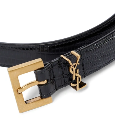 Shop Saint Laurent Monogram Lizard-embossed Leather Belt In Black