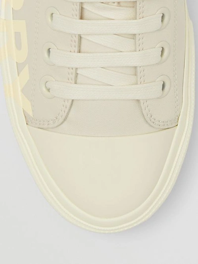 Shop Burberry Logo Print Cotton Garbadine Sneakers In Vanilla