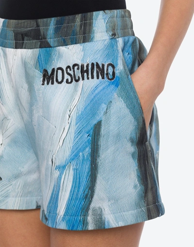Shop Moschino Painting Fleece Shorts In Light Blue