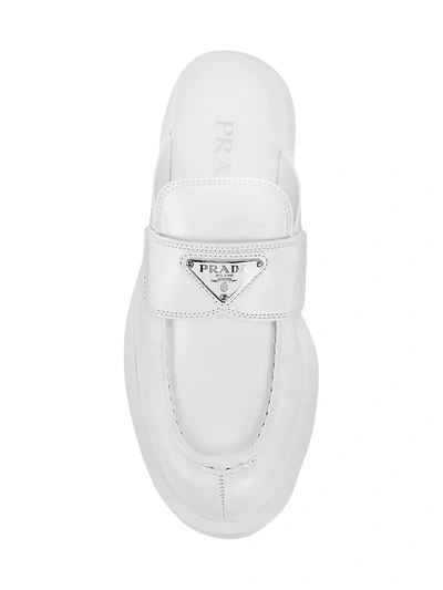 Shop Prada Logo Leather Mules In Bianco