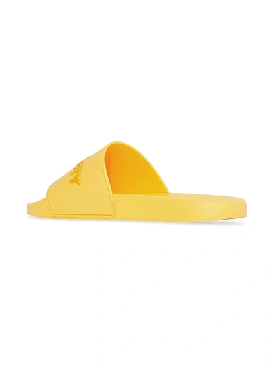 Shop Burberry Furley Slide Sandals In Yellow