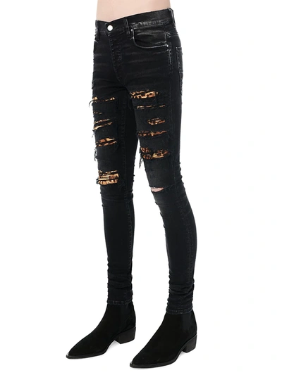 Shop Amiri Leopard Thrasher Five-pocket Jeans In Aged Black
