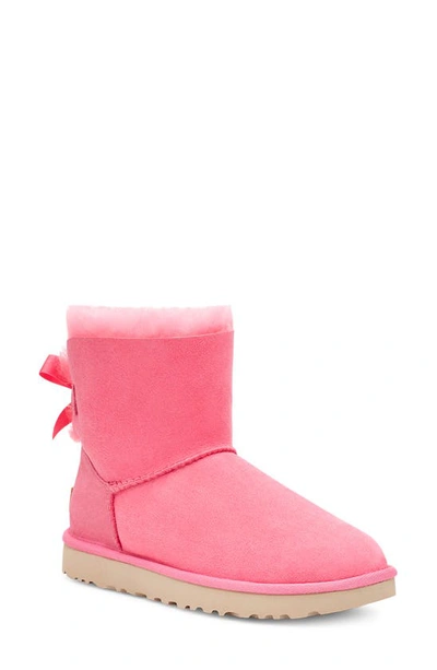 Shop Ugg (r) Mini Bailey Bow Ii Genuine Shearling Bootie In Pink Rose