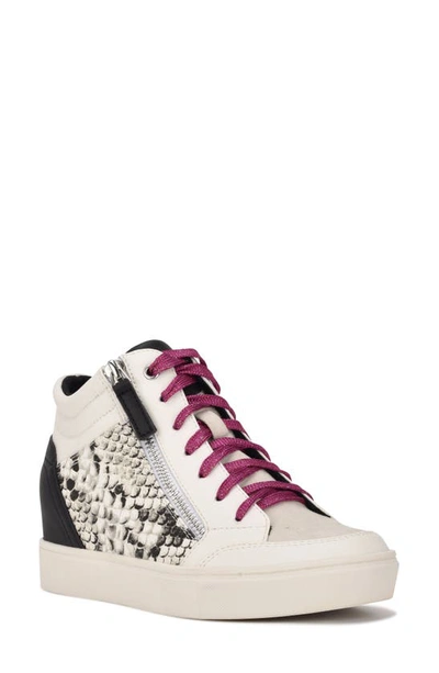 Shop Nine West Tons Lace-up Wedge Sneaker In White/ Snake Multi