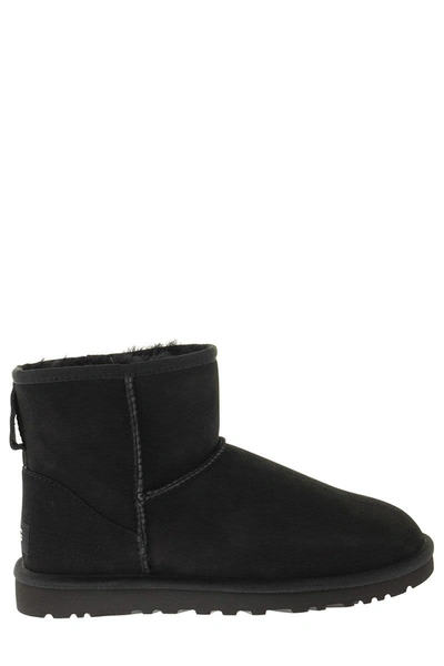 Shop Ugg Mini Classic - Boots In Black