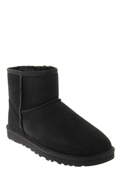 Shop Ugg Mini Classic - Boots In Black