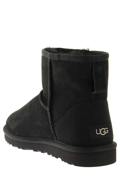 Shop Ugg Mini Classic - Boots In Black