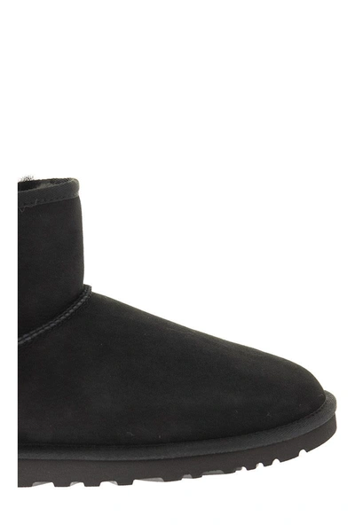 Shop Ugg Mini Classic - Boots In Black