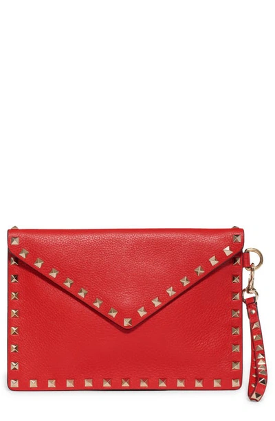Shop Valentino Large Rockstud Leather Envelope Pouch In Rouge
