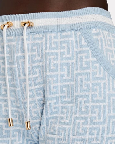 Shop Balmain Monogram Knit Jacquard Running Shorts In Light Blue