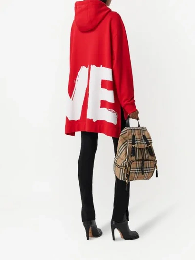 Shop Burberry Love-print Oversized Cotton Hoodie In Red
