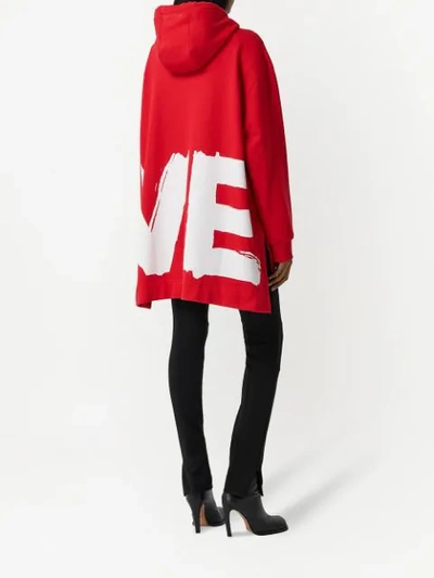 Shop Burberry Love-print Oversized Cotton Hoodie In Red