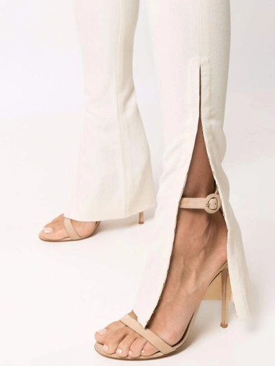 Shop Jacquemus Trousers White
