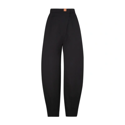 Shop Loewe Carrot Trousers In Wool Pants In Black