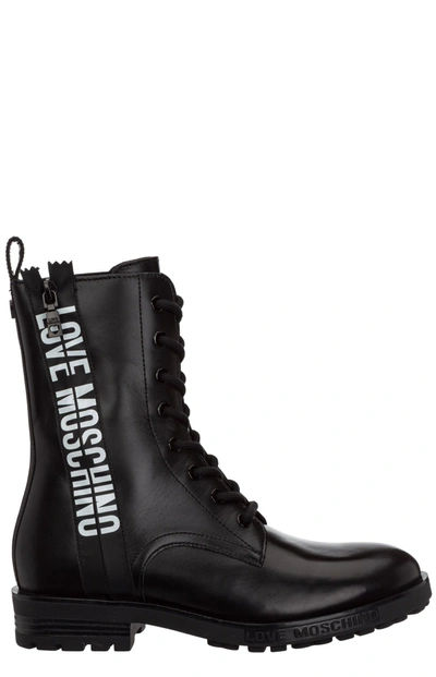 Shop Love Moschino Logo Print Combat Boots In Black