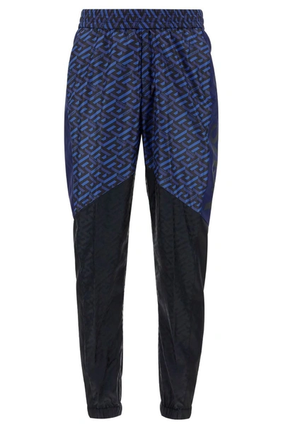 Shop Versace Panelled Logo Print Sweatpants In Multi