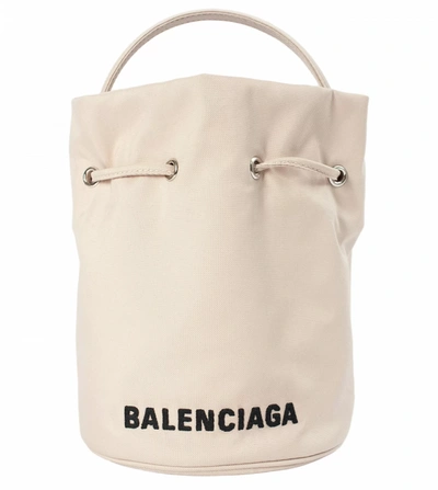 Shop Balenciaga Beige Wheel Xs Bucket Bag