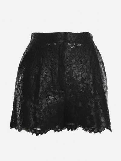 Shop Dolce & Gabbana Shorts Made Of Laminated Effect Lace In Black