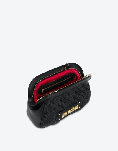 Shop Love Moschino Lettering Logo Quilted Clutch In Black